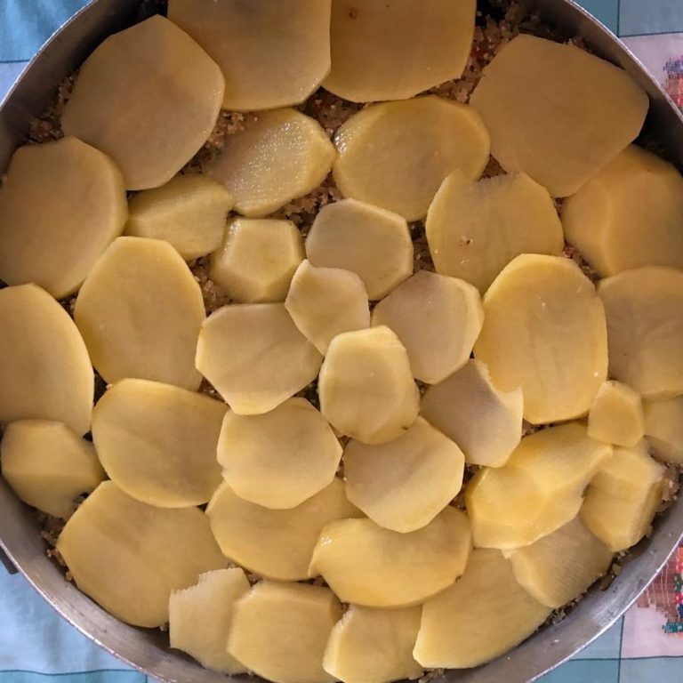 Ricetta riso patate e cozze tiella preparazione